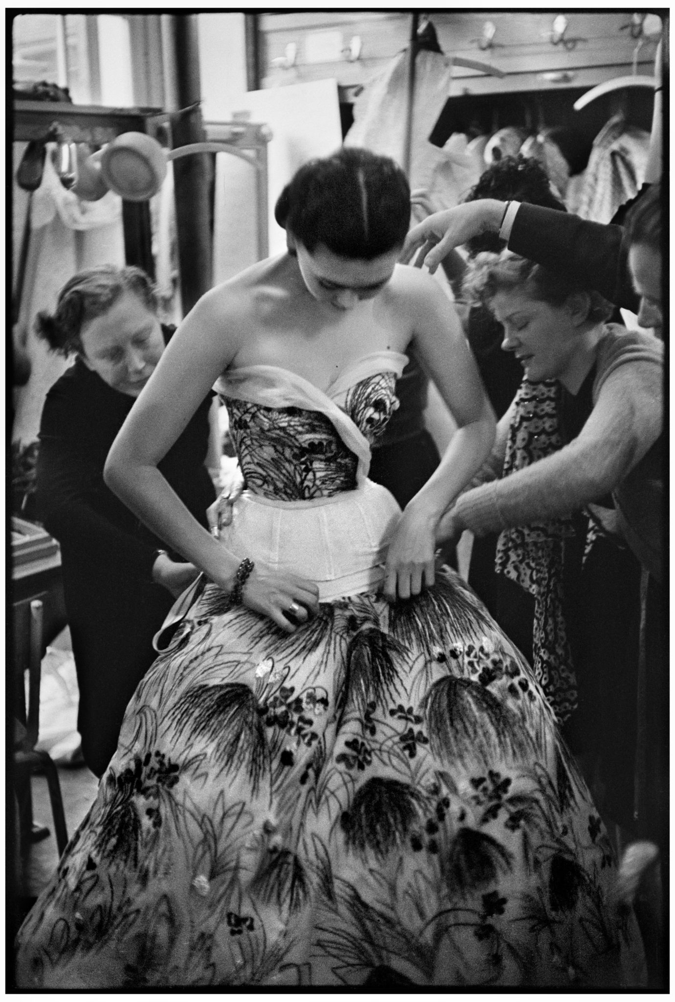 FRANCE. Paris. Spring 1953. Dior fashion house. Model before a show. FRANCE. Paris. Spring 1953. Dior fashion house. Model before a show.